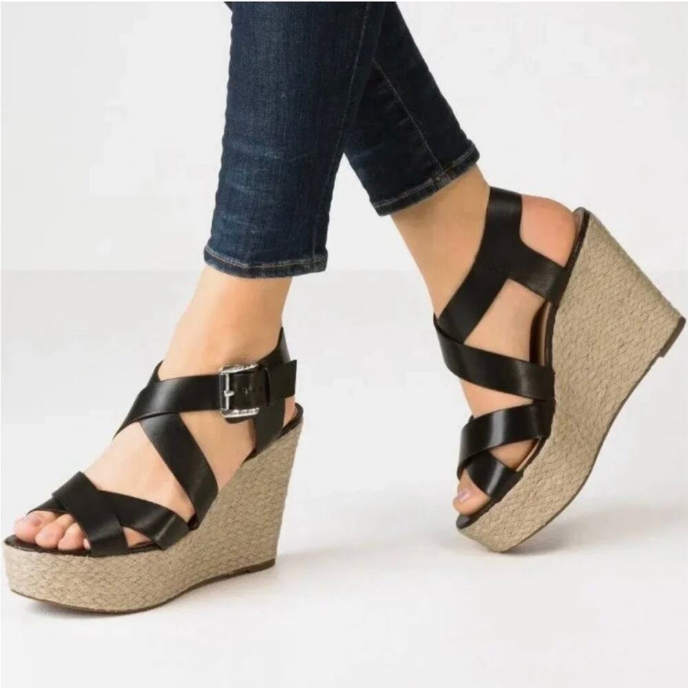 Michael Kors Black Leather Celia Wedge Sandals
Size 8.5